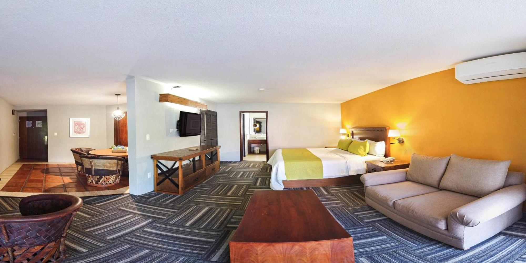 โรงแรมเรอัล เด มินาส ซานมิเกล เด อาเญนเด ภายนอก รูปภาพ A typical hotel room